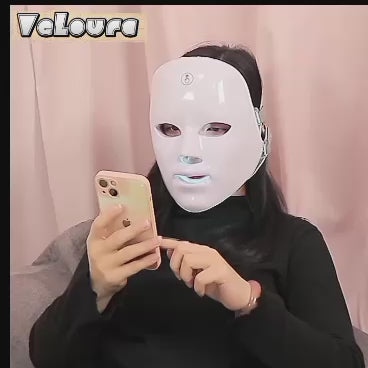 Wireless 7-color silicon LED mask demonstrating flexible wearable light therapy for facial skin